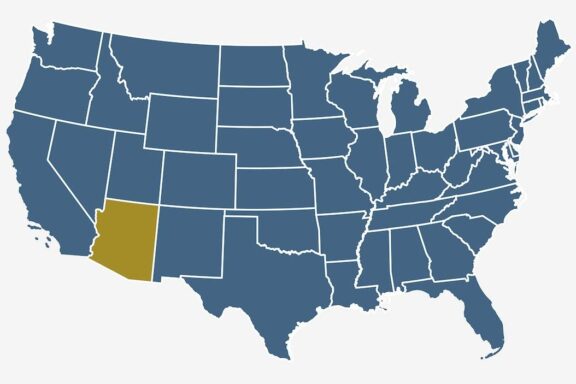 A stylized map of the United States with state boundaries marked and the state of Arizona in the southwestern region highlighted in gold color.