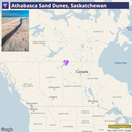 Map highlighting the location of Athabasca Sand Dunes in Saskatchewan, Canada, with an inset photograph showing an aerial view of the textured sand dunes.