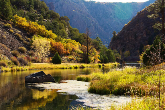 The steep, dramatic cliffs and Gunnison River of Black Canyon