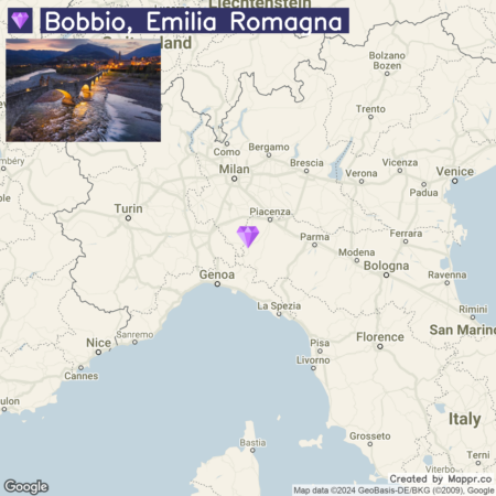 Map of Italy highlighting the location of Bobbio in Emilia Romagna with a small inset photo of a twilight scene over a river in Bobbio.