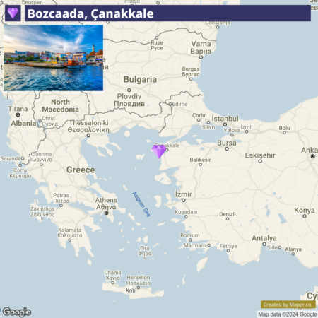 A map showing Bozcaada in Çanakkale, Turkey, with a small photo insert displaying a waterfront scene with colorful buildings. Nearby cities and countries like Greece, Bulgaria, and parts of Turkey, including Istanbul and Izmir, are also visible on the map.