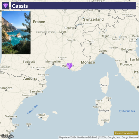 An inset image of a coastline with cliffs and blue water in the upper left corner with the label "Cassis" and a main image of a map showing parts of Southern France, Northern Italy, Switzerland, and surrounding regions, with city markers and geographical names such as "Monaco" and "Corsica" visible.