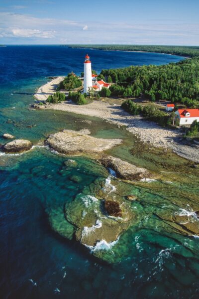 Clear blue waters and rugged cliffs of Ontario's Bruce Peninsula coastline