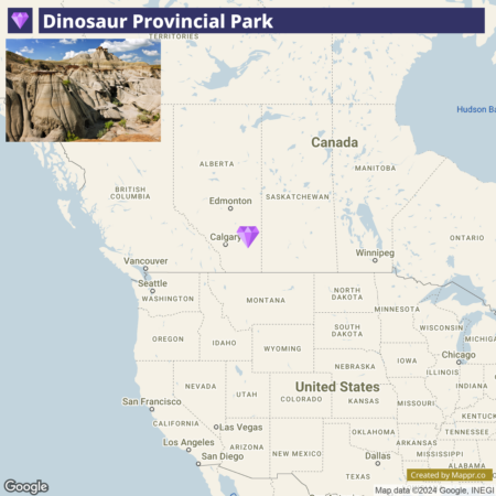 A map showing the location of Dinosaur Provincial Park in Canada, with a purple pin near Calgary in Alberta. The map includes parts of Canada and the United States, with state and province boundaries marked. There's also an inset photo in the top left corner depicting the rugged landscape of the park.