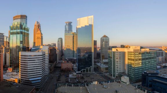 Downtown Minneapolis Skyline at Sunset An Ultra Wide Angle Panoramic Shot of Sprawling Downtown Minneapolis during a Spring Golden Hour.