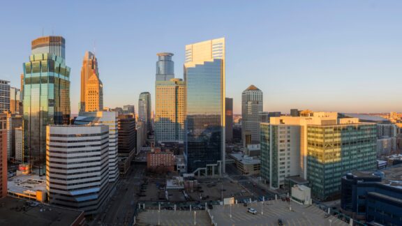 An Ultra Wide Angle Panoramic Shot of Sprawling Downtown Minneapolis during a Spring Golden Hour.