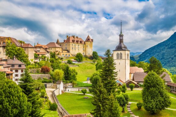 Gruyères' medieval charm amidst rolling green pastures