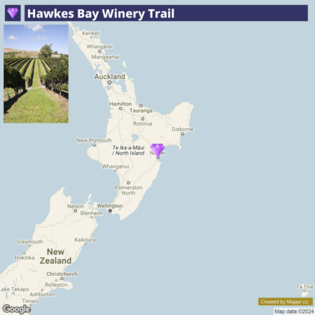 A map of New Zealand highlighting Hawkes Bay Winery Trail on the North Island, with an inset photo of vineyards in the upper left corner.