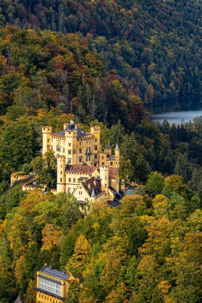 Hohenschwangau Castle Amidst Autumn Foliage Hohenschwangau Castle, a royal retreat with an alpine backdrop