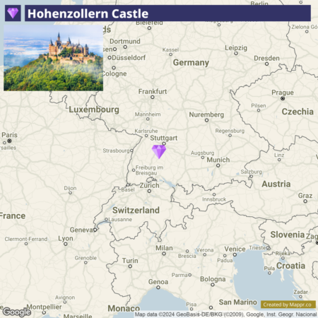 A map highlighting the location of Hohenzollern Castle in Germany, with an inset image of the castle perched atop a hill surrounded by forest.