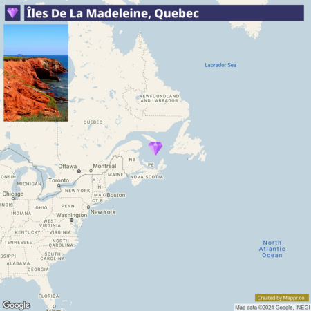 Map highlighting the location of Îles De La Madeleine, Quebec in the Gulf of St. Lawrence, Canada, with an inset image of red cliffs against a blue sky in the upper left corner.