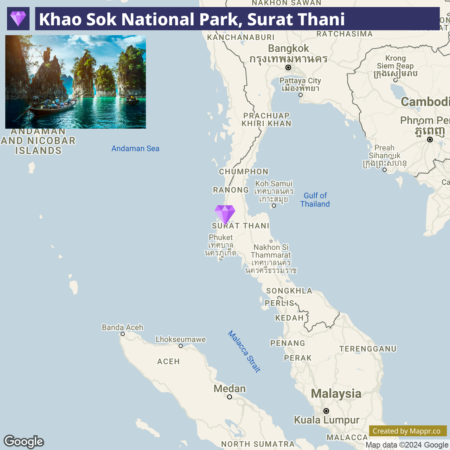 Map highlighting Khao Sok National Park in Surat Thani, Thailand, with an inset photo of the park featuring limestone karsts and a longtail boat on a blue lake.