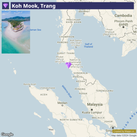 An aerial view of Koh Mook Island in Trang, Thailand, with a focus pin on the map and the surrounding regions labelled, including nearby islands and mainland areas such as Phuket, Malaysia, and the Gulf of Thailand.