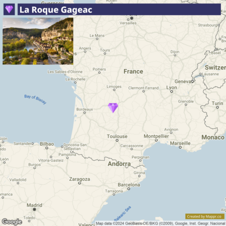 A map showing the location of La Roque Gageac in France, with a purple diamond marker indicating its position southwest of the center of the map. The map is a zoomed-in section of Western Europe, showing surrounding major cities and labels such as Bordeaux, Toulouse, and Bay of Biscay.