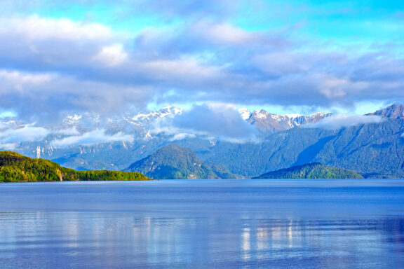 Lake Manapouri's reflective beauty in the heart of Fiordland