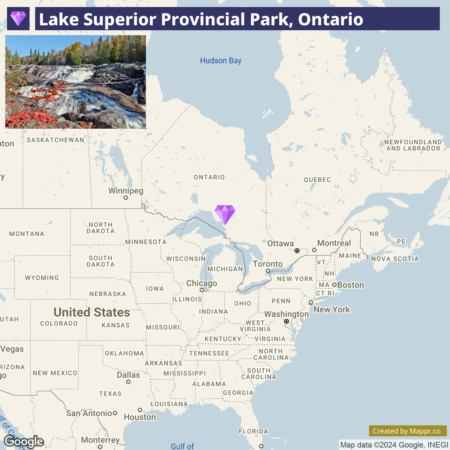 A map highlighting Lake Superior Provincial Park in Ontario, Canada, with a small picture insert of a rocky, forested landscape featuring a waterfall and red foliage.