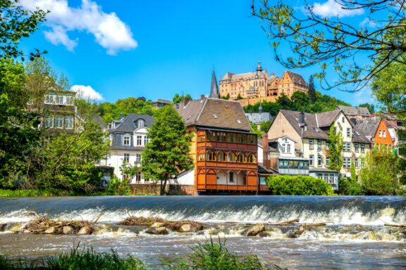 Marburg Town with Castle Overlooking River The picturesque Marburg, highlighting its intellectual and architectural heritage