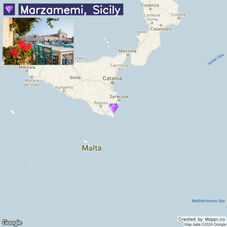 Alt text: A map highlighting Marzamemi, Sicily, with a pinned location near Syracuse, alongside an inset photo showing a seaside view with a blue chair and red flowers.