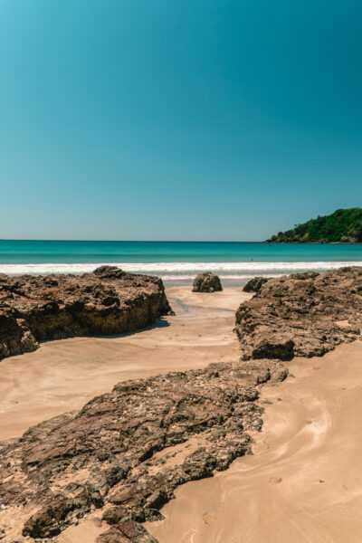 Matapouri Bay's serene waters cradled by Whangarei's scenic beauty