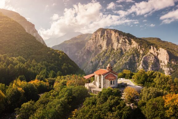 Olympus' godly peaks, mythic summits touching the heavens