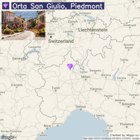 Map showing the location of Orta San Giulio in Piedmont, Italy, with a purple diamond marker indicating the town's position between Milan and Turin, near Lake Maggiore. The map displays surrounding areas in Switzerland and Italy with city names and boundaries.