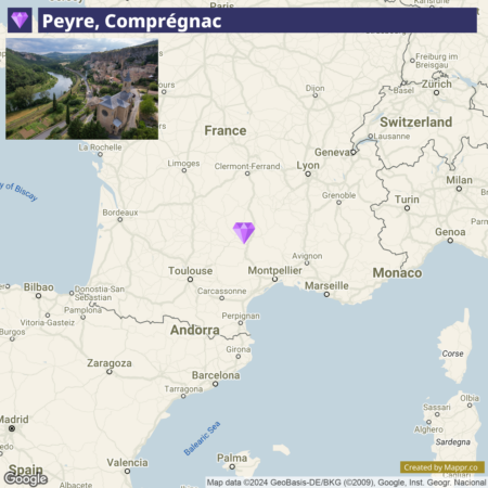 A map showing a labeled location "Peyre, Comprégnac" in southern France with a small inset image of the village of Peyre overlooking a river, surrounded by vegetation. The main map highlights the surrounding geography including parts of France, Spain, Andorra, the Bay of Biscay, and the Mediterranean Sea, with prominent nearby cities such as Toulouse, Bordeaux, Lyon, and Barcelona.