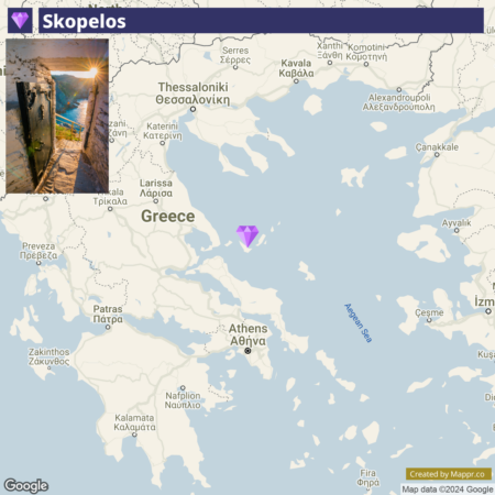 An inset photo of a coastal view through a rustic door superimposed on a Google map of Greece highlighting the location of Skopelos Island.