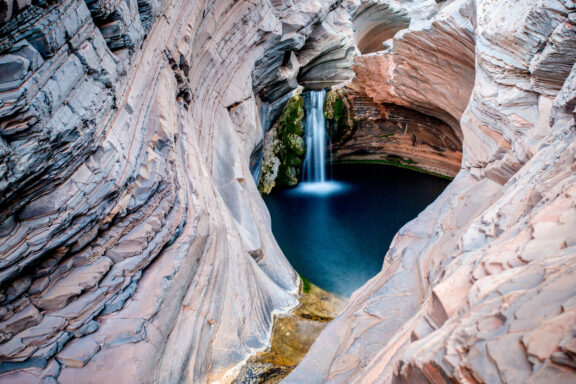 An enchanting natural spa set in red rock gorges at Karijini National Park