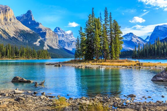 Spirit Island, surrounded by Alberta's mountainous terrain