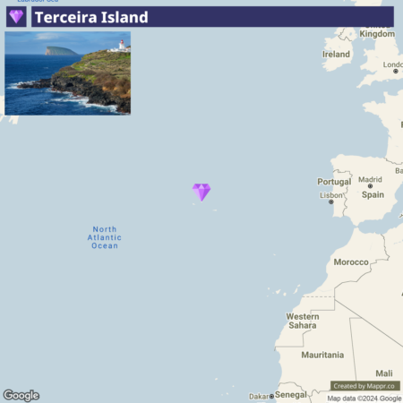 A map highlighting Terceira Island with a picture insert of a coastal scene with cliffs and a lighthouse atop, set in the North Atlantic Ocean near Portugal.