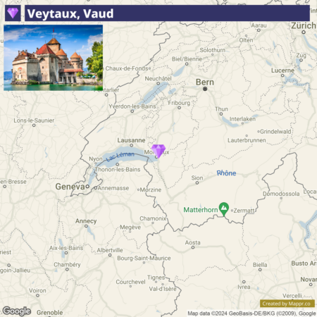 A screenshot of a map highlighting Veytaux, Vaud in Switzerland with an inset image of Chillon Castle at the top left corner. The map shows nearby towns and geographical features such as Geneva, Lausanne, Bern, and the Matterhorn.