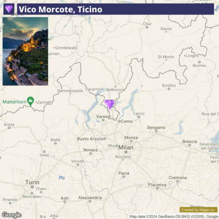 A map highlighting Vico Morcote in Ticino with a top-left inset image of a lakeside town at dusk. The map shows surrounding geographical locations and city names such as Como, Milan, and Turin, along with natural landmarks such as the Matterhorn and Zermatt.