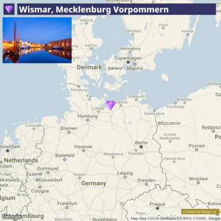 A split image with the upper part showing a twilight scene of Wismar's waterfront with illuminated buildings reflected in the water, with the text "Wismar, Mecklenburg Vorpommern" and the lower part displaying a map of northern Germany highlighting Wismar's location.