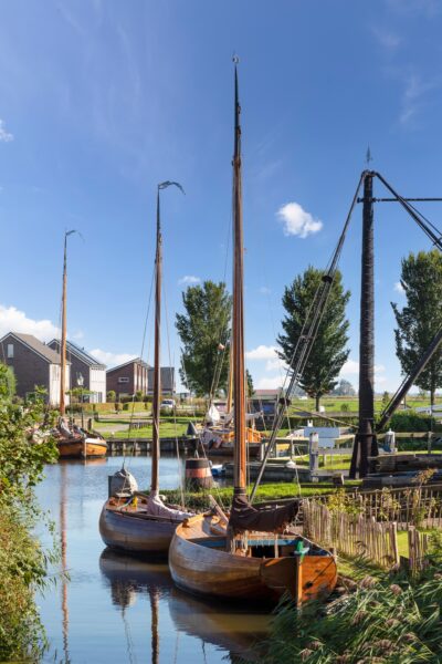 Old wooden fishing boats at the shipyard near Workum