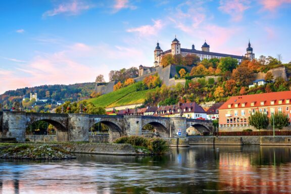 Würzburg Cityscape with Old Bridge and Fortress Würzburg's Residenz, exemplifies opulent Baroque architecture