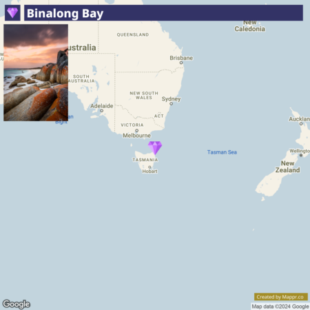 A map highlighting Binalong Bay in Tasmania, Australia, with a thumbnail of a sunset over a rocky beach in the bottom left corner.