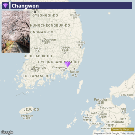 Map of South Korea highlighting the city of Changwon with a purple marker, overlaid with a smaller image in the top left corner showing a pathway lined with cherry blossom trees.