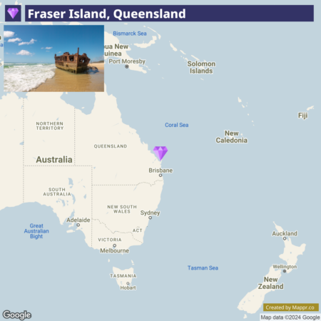 An image combining a photograph and a map. The top portion features the title "Fraser Island, Queensland" with a photograph of a rusted shipwreck on a sandy beach with waves washing ashore. The bottom portion shows a map highlighting the location of Fraser Island off the east coast of Australia, near Brisbane, with surrounding labels for Australian cities, neighboring countries, and bodies of water.