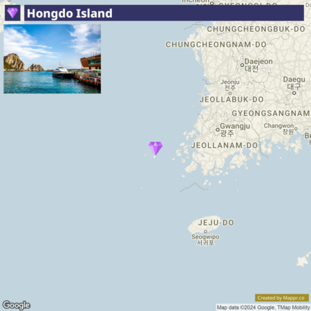 A screenshot depicting Hongdo Island with a marker indicating its location on a map. The map includes geographic labels such as Jeollanam-do and Jeju-do, and the upper portion of the image shows a picturesque view of the island's rocky coastline and a boat moored at a dock under a clear blue sky.