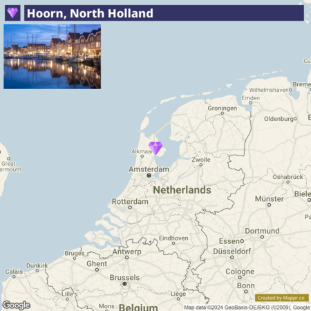 A map showing Hoorn's location in North Holland, Netherlands, with a small inset photo displaying a nighttime view of Hoorn's waterfront and architecture.