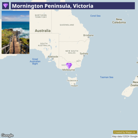 A map featuring the location of Mornington Peninsula in Victoria, Australia, marked with a purple diamond south-east of Melbourne, with an inset image of a wooden boardwalk leading towards the ocean.