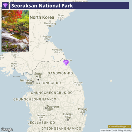 A map showing Seoraksan National Park in South Korea, prominently marked with a purple pointer within the Gangwon-do region, near the eastern coast. The map also labels surrounding regions and a few cities, with a section of North Korea visible to the north. A small inset photo in the bottom left corner displays a scenic view with colorful autumn foliage and a stream. "Google" and "T Map Mobility" attributions are present at the bottom.