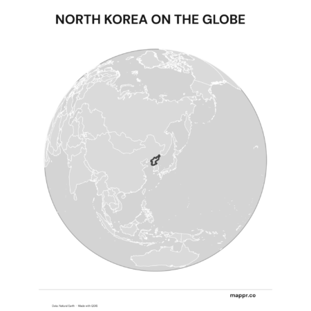 A map highlighting North Korea's location on a globe, marked with a red outline (black and white).