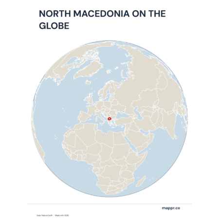 A map highlighting North Macedonia's location on a globe, marked with a red outline.