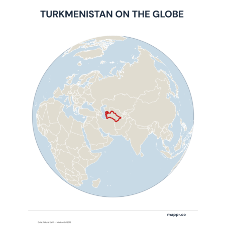 A map highlighting Turkmenistan's location on a globe, marked with a red outline.